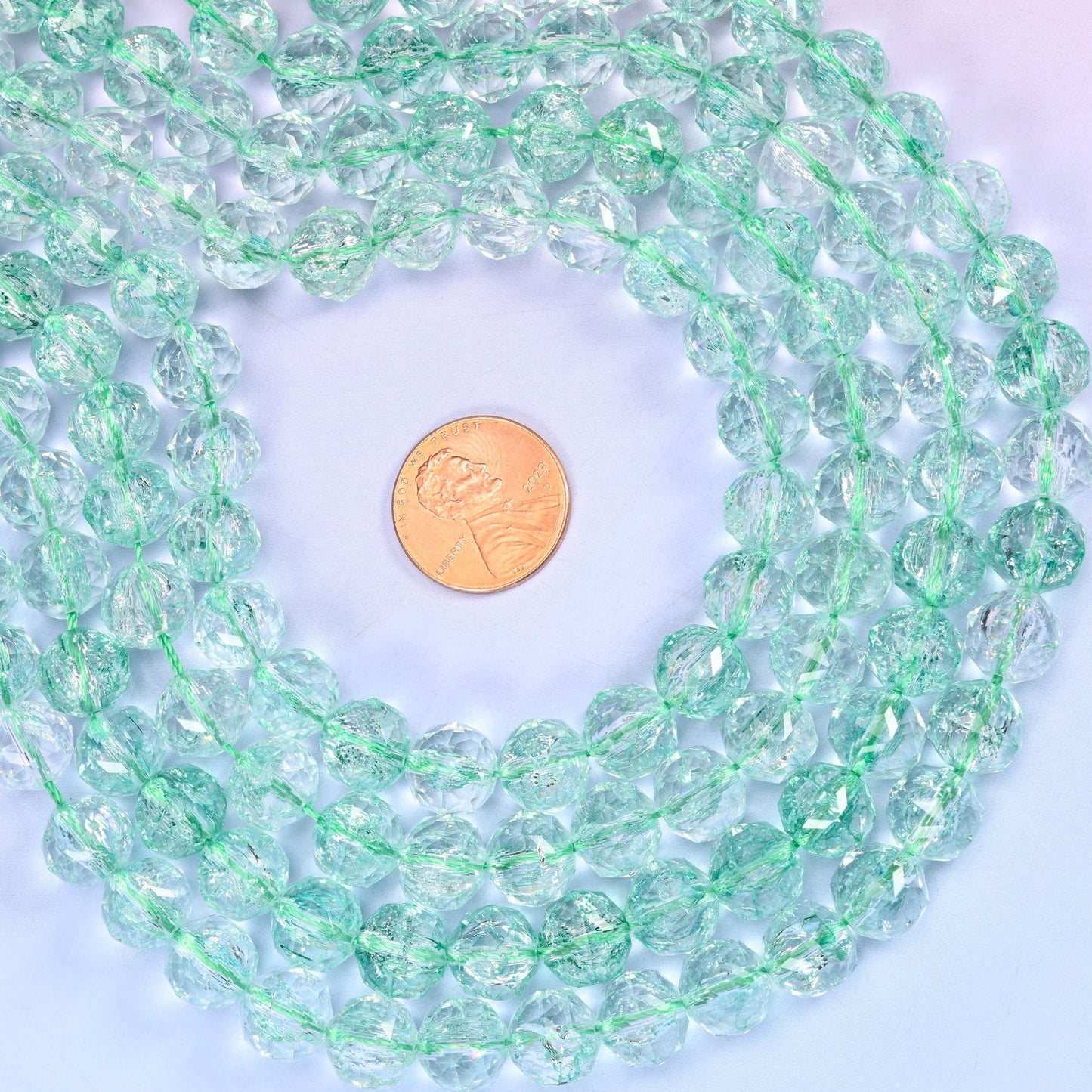 Transparent Green Faceted Round Glass Beads, cut with many small facets