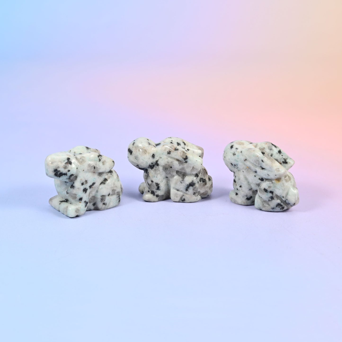 1.5 inch carved stone rabbit figurine, natural stone so veining and colour vary piece to piece