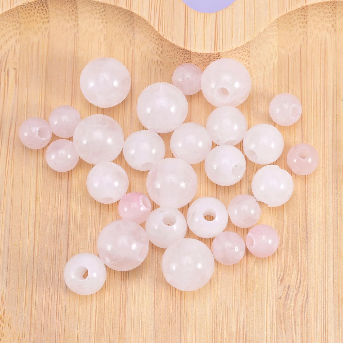 Rose Quartz beads in milky pale pink with a soft lilac cast