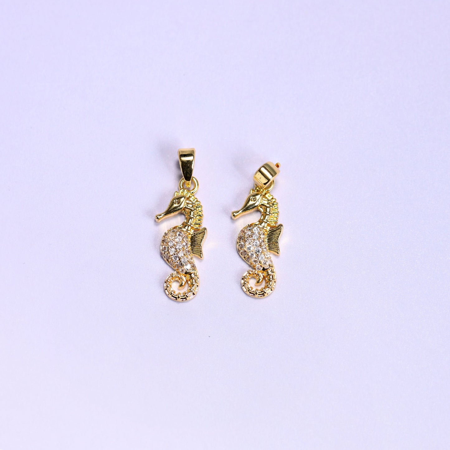 Sea Horse Zircon Pendants in warm gold or cool platinum tone