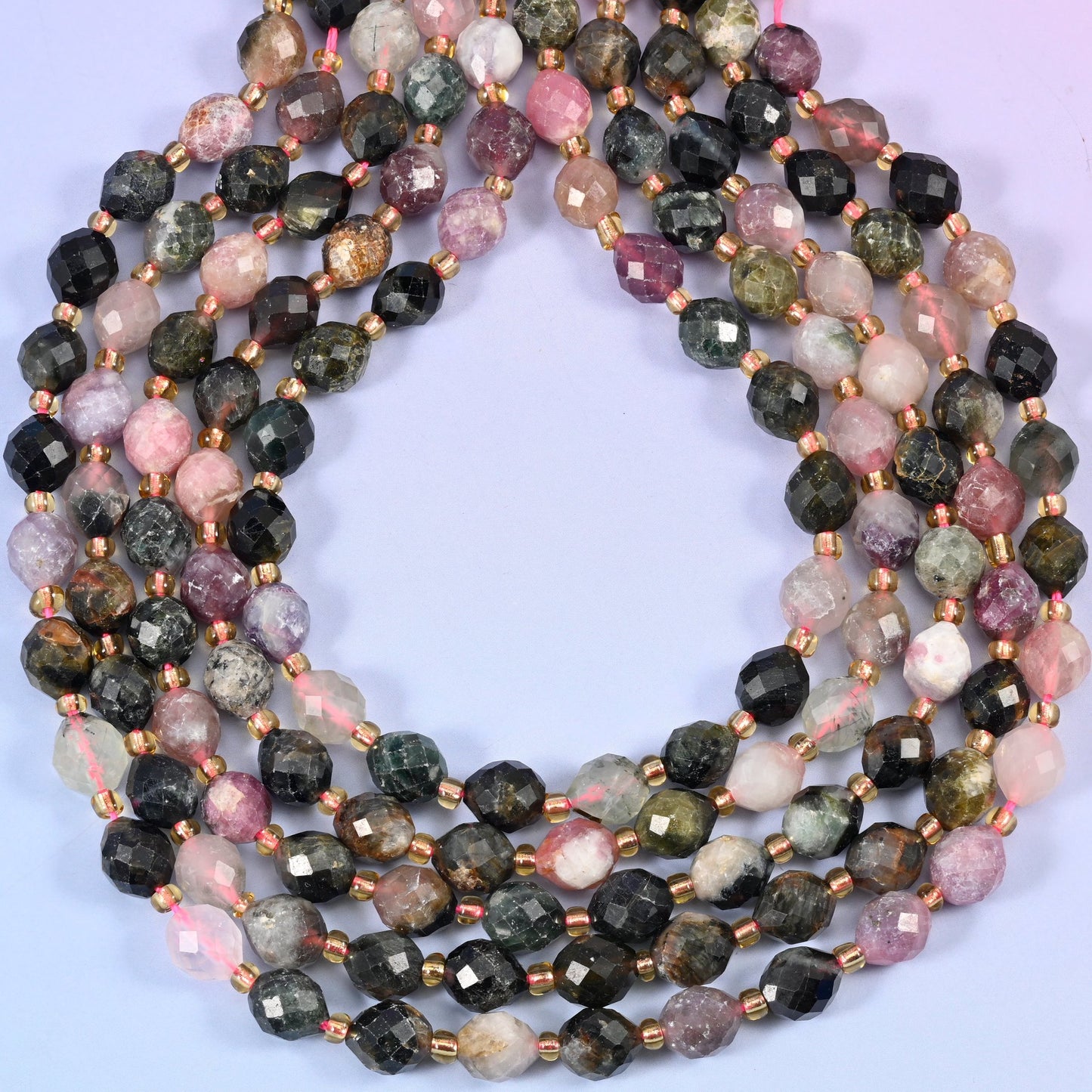Vibrant multi-color Tourmaline beads in a faceted rice barrel shape