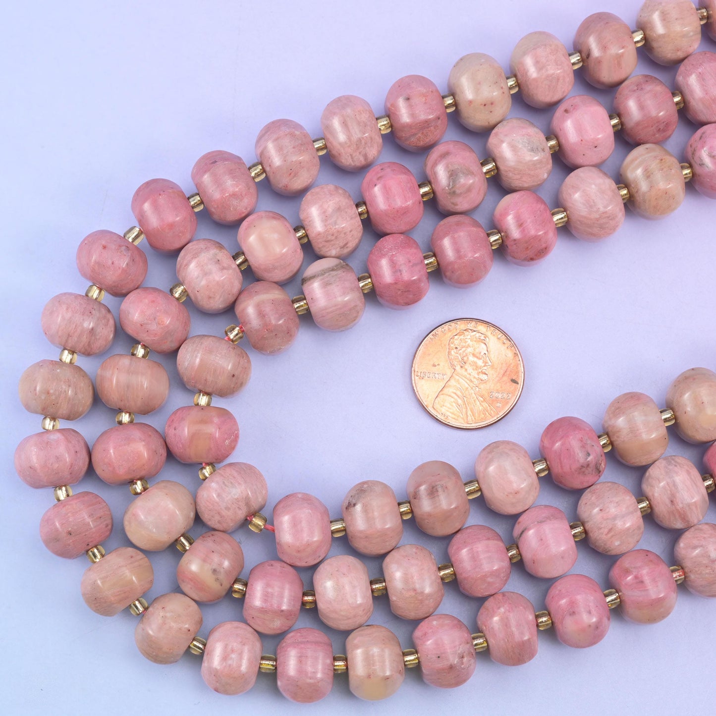 Pink rhodonite pumpkin beads, 15 inch strand