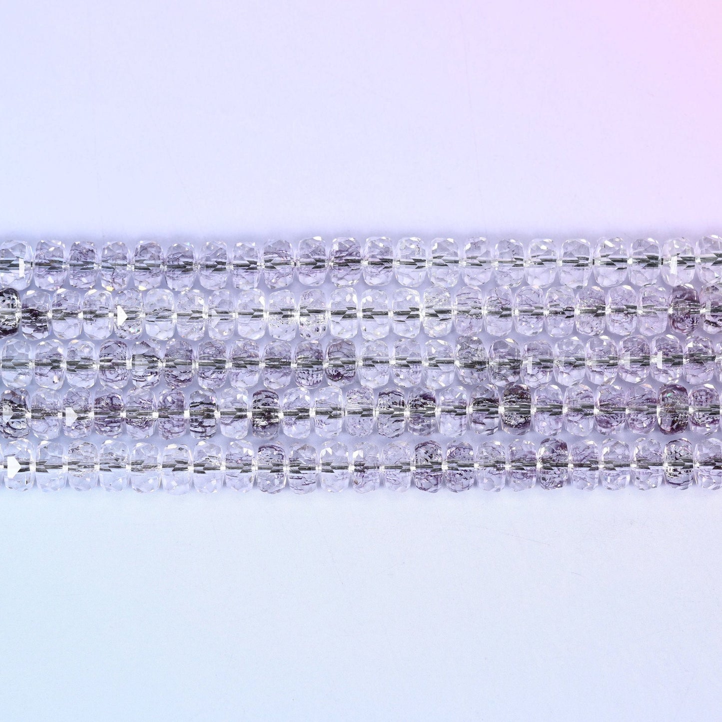 Transparent Light Purple Faceted Rondelle Glass Beads in pale smoky lilac