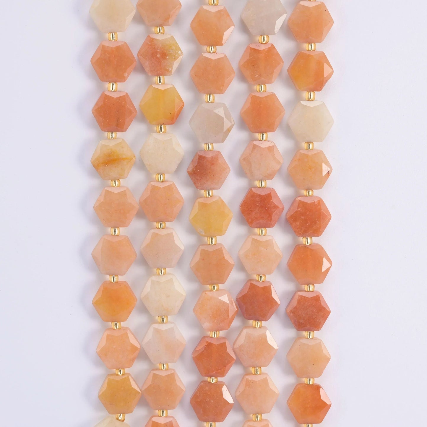 Gold Silk Jade hexagon beads, 15.5 inch strand.
