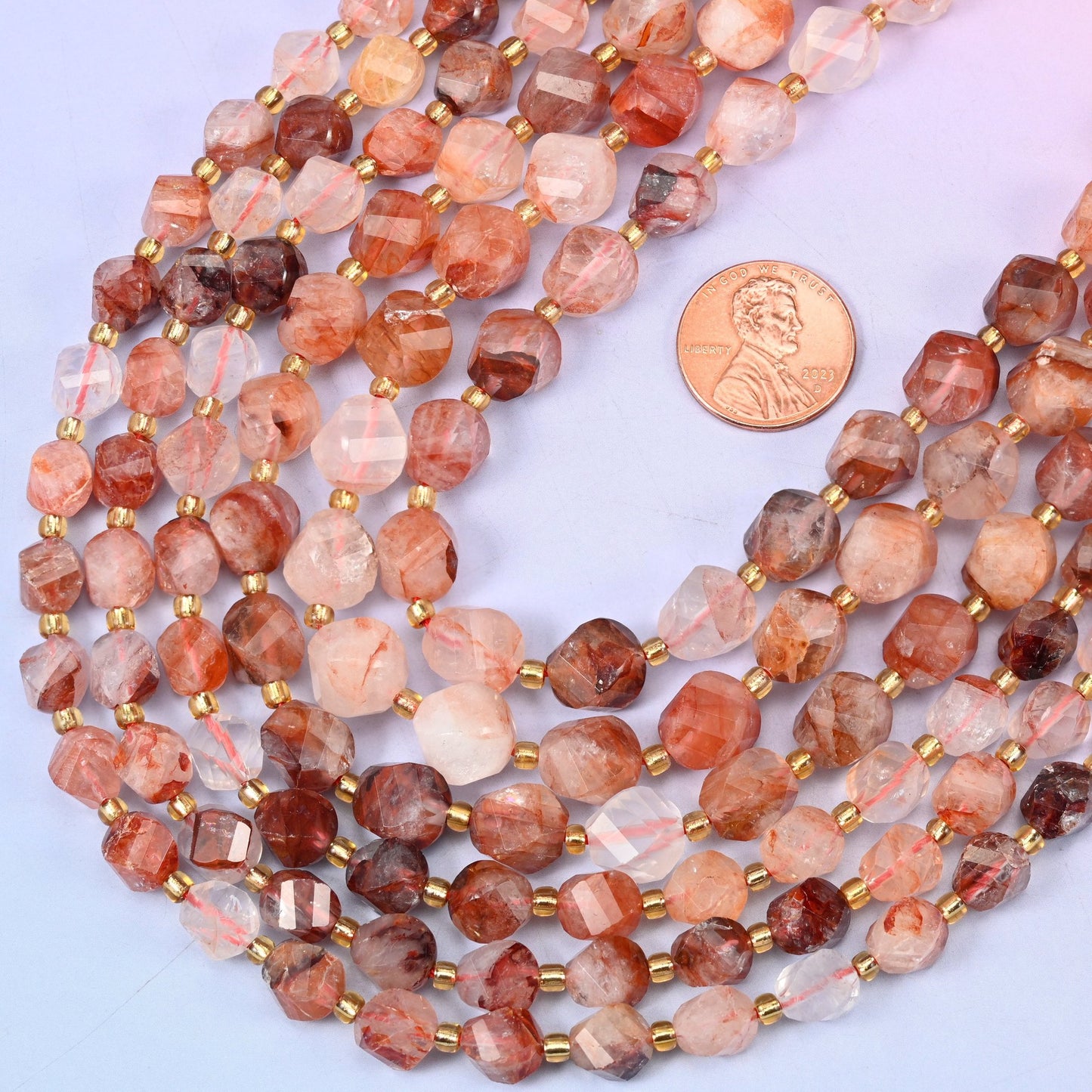Faceted spiral twist cut natural red hematoid quartz beads