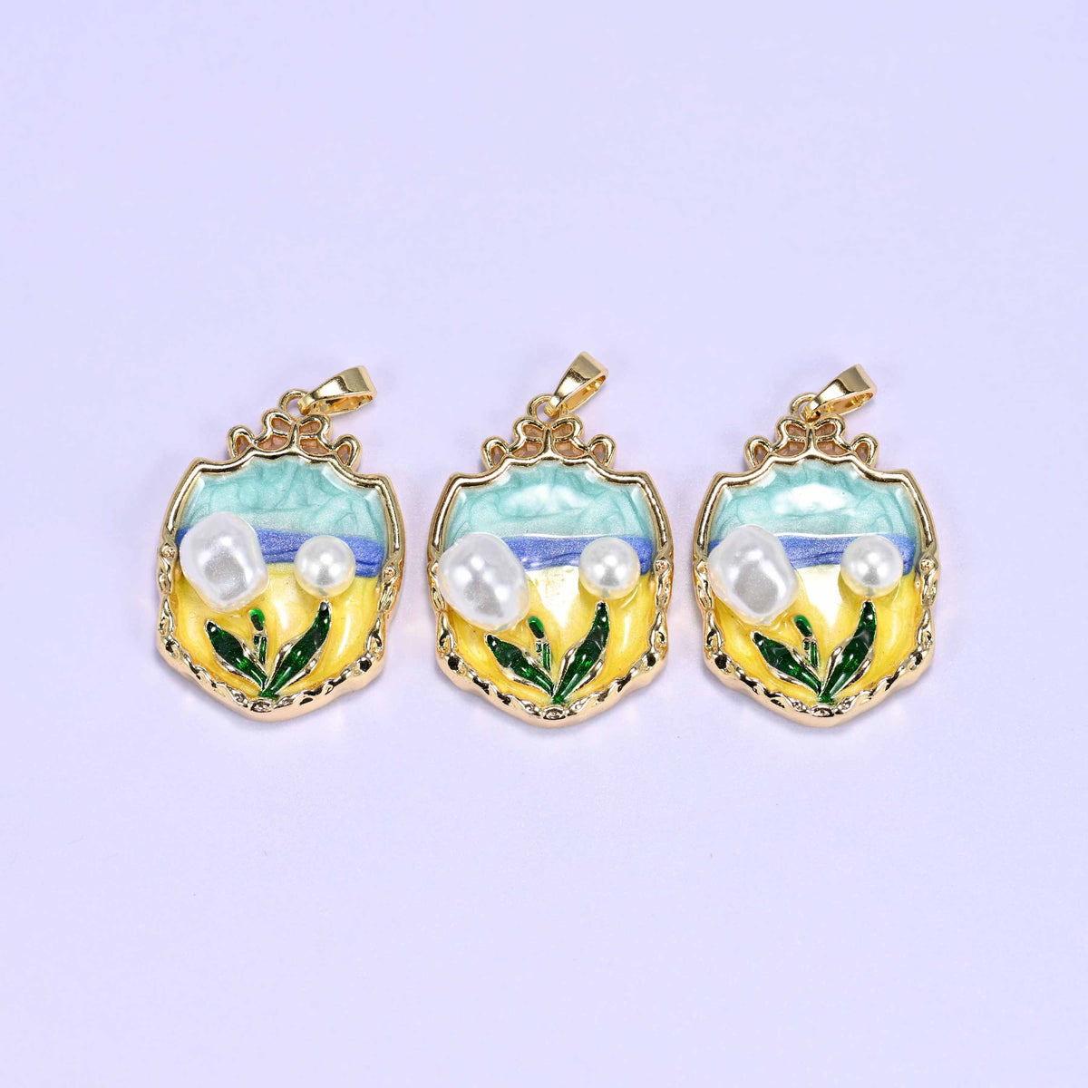 Tulip charm with a teal and yellow enamel garden scene