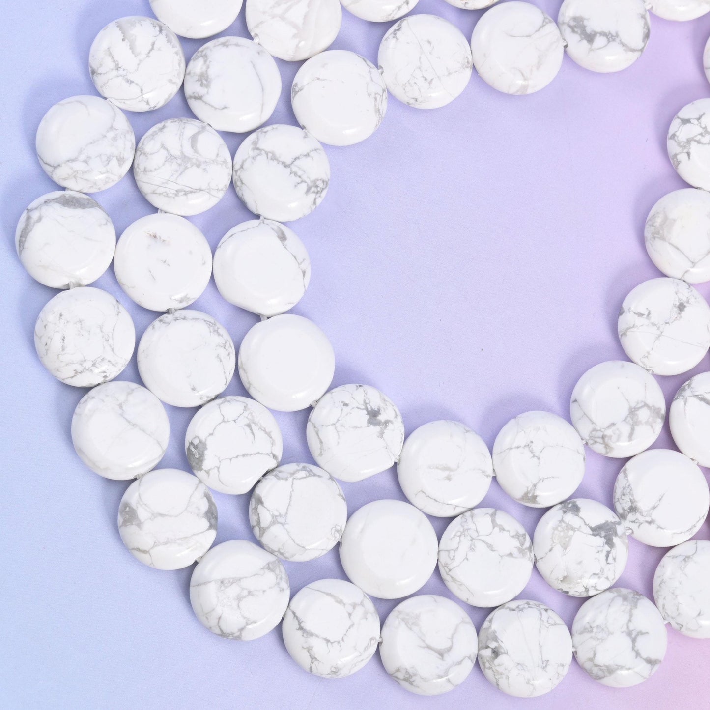White Howlite coin beads, approximately 26 beads per strand