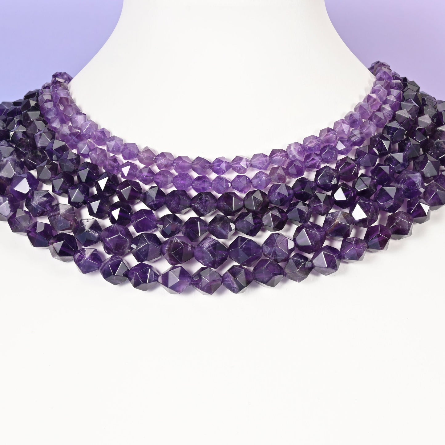 Amethyst beads, diamond star cut shape.