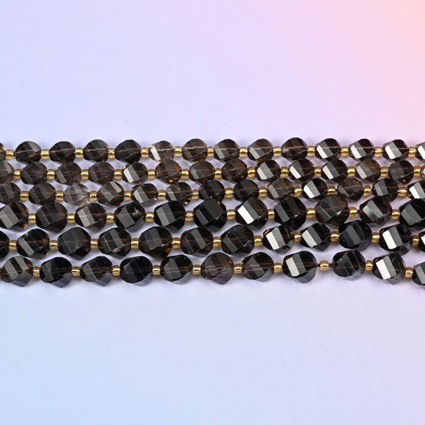 Smoky Quartz beads in translucent coffee brown deepening to near-black