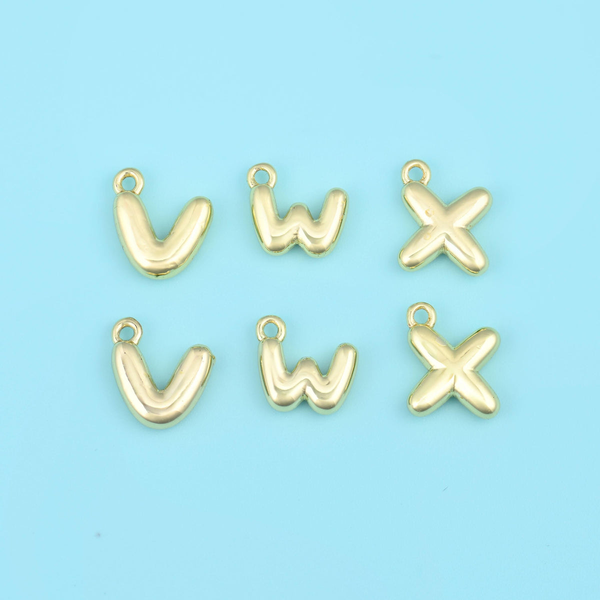 18K gold plated letter pendants V, W and X, balloon initials with bail loops.