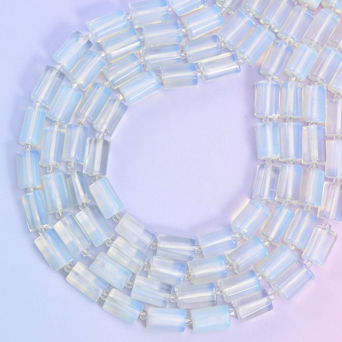 Opalite Faceted Tube Beads, approximately 28 beads per strand
