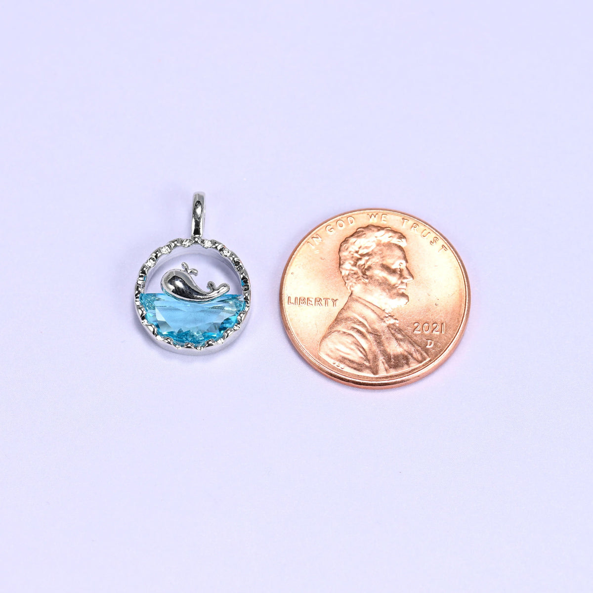 Silver round zirconia whale charm, approximately 17mm x 12mm