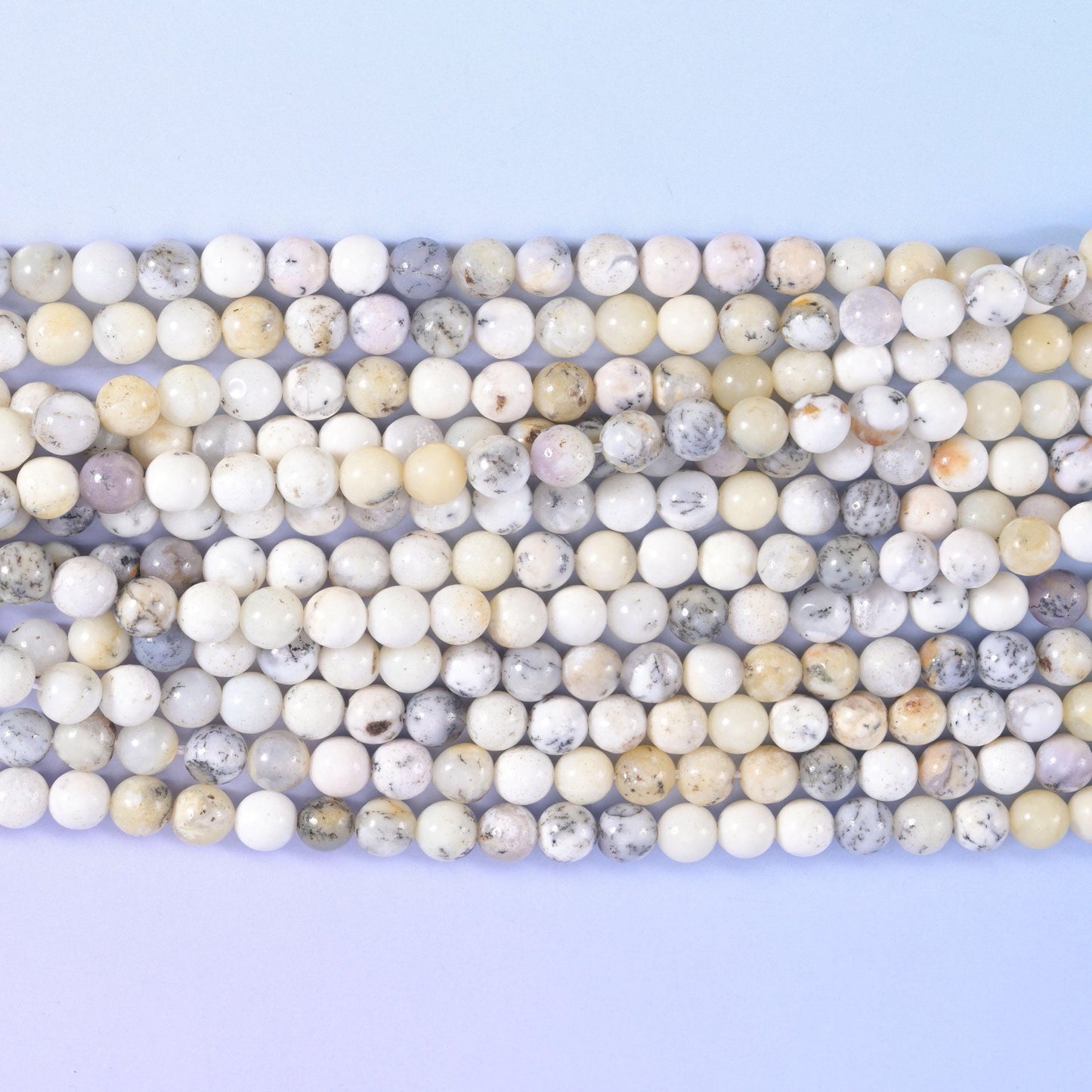 Smooth round cut white opal beads