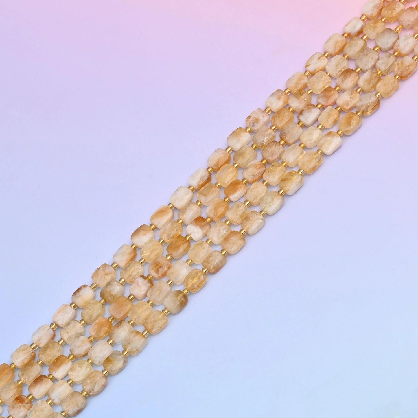 Citrine beads in warm champagne and pale honey tones