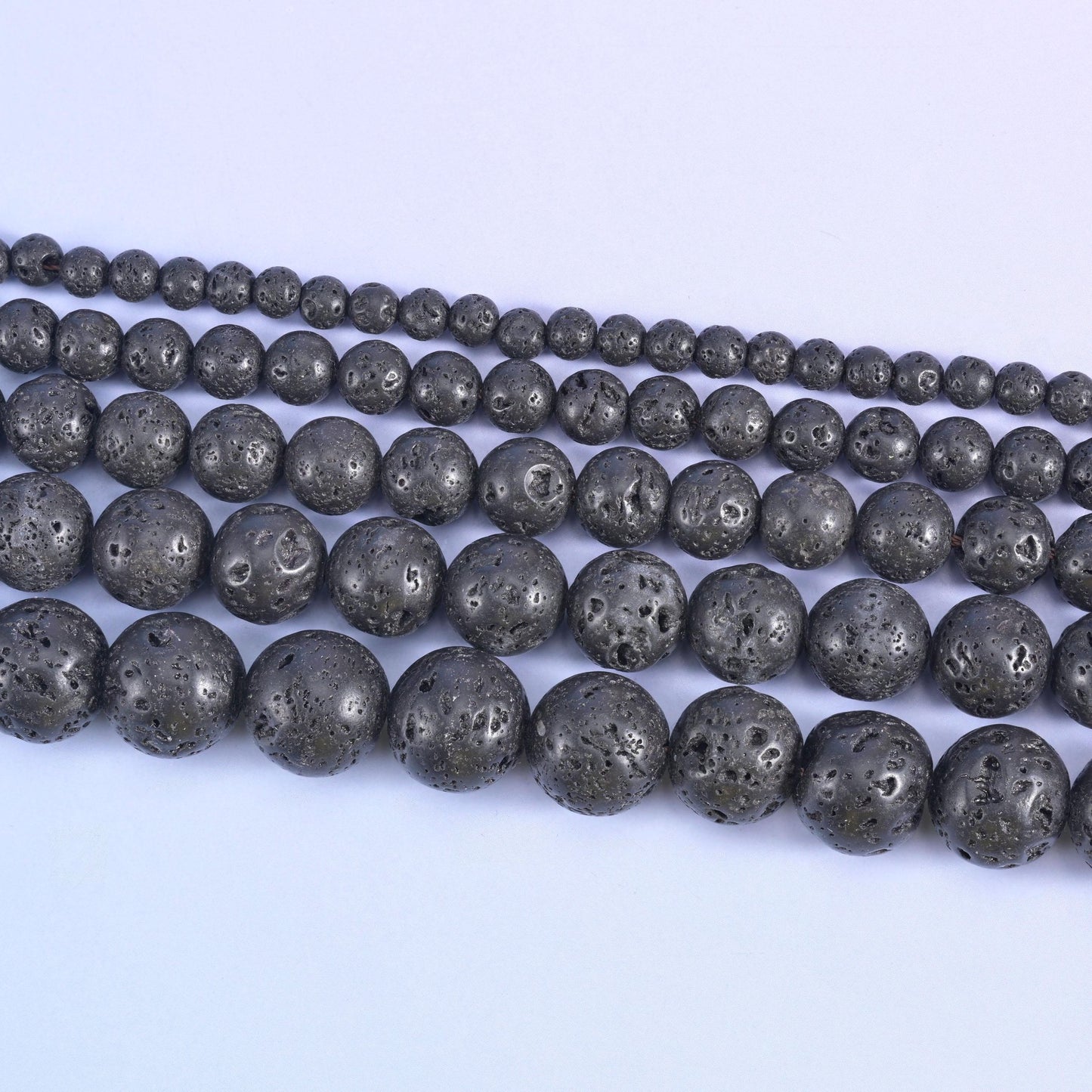 Lava rock round beads, approximately 47 beads per 15 inch strand