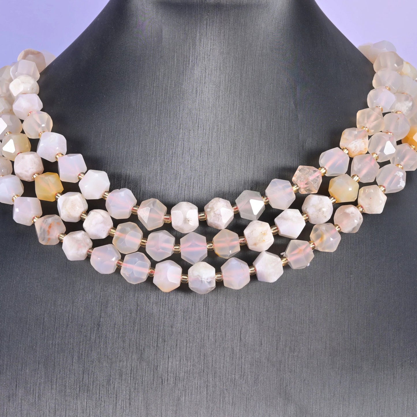 Diamond cut gemstone beads, approximately 36 beads on a 15.5 inch strand.
