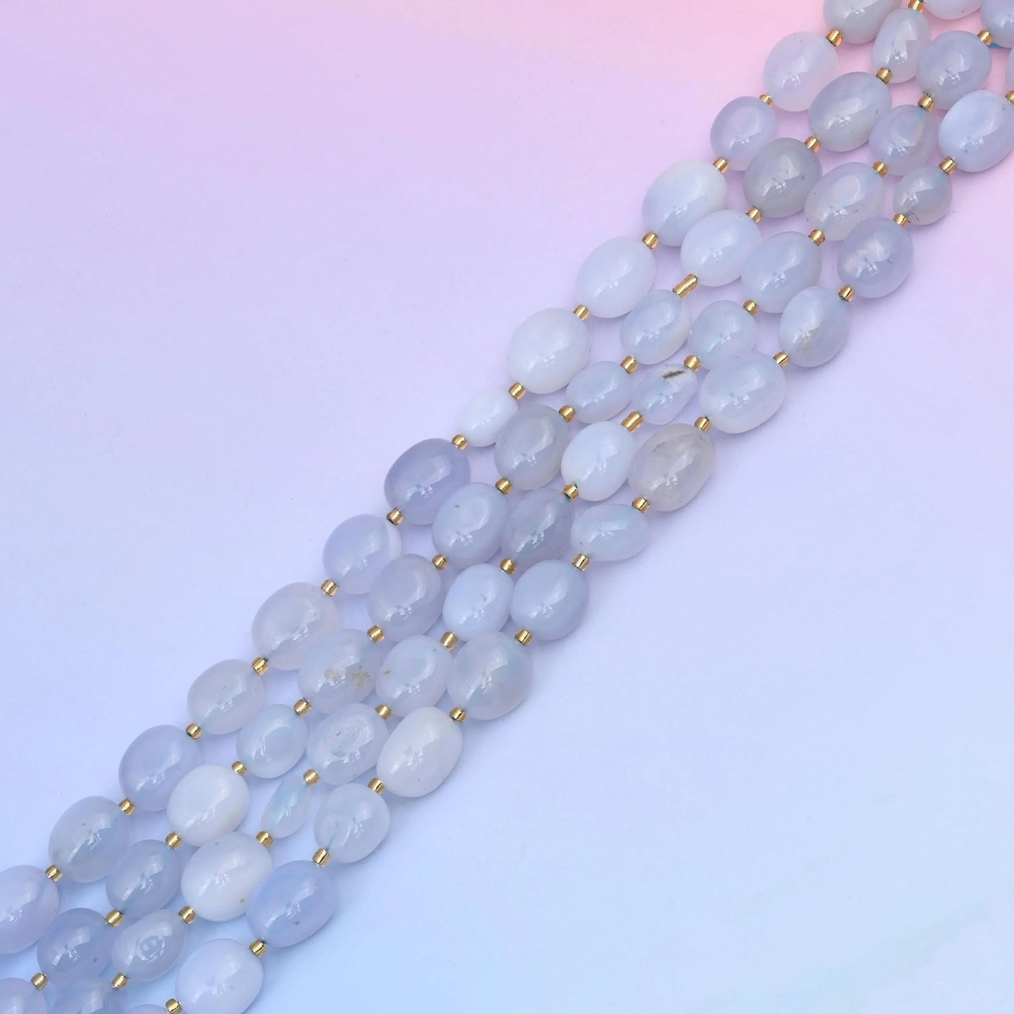 Blue Chalcedony in pale ice blue with a lavender-grey cast.