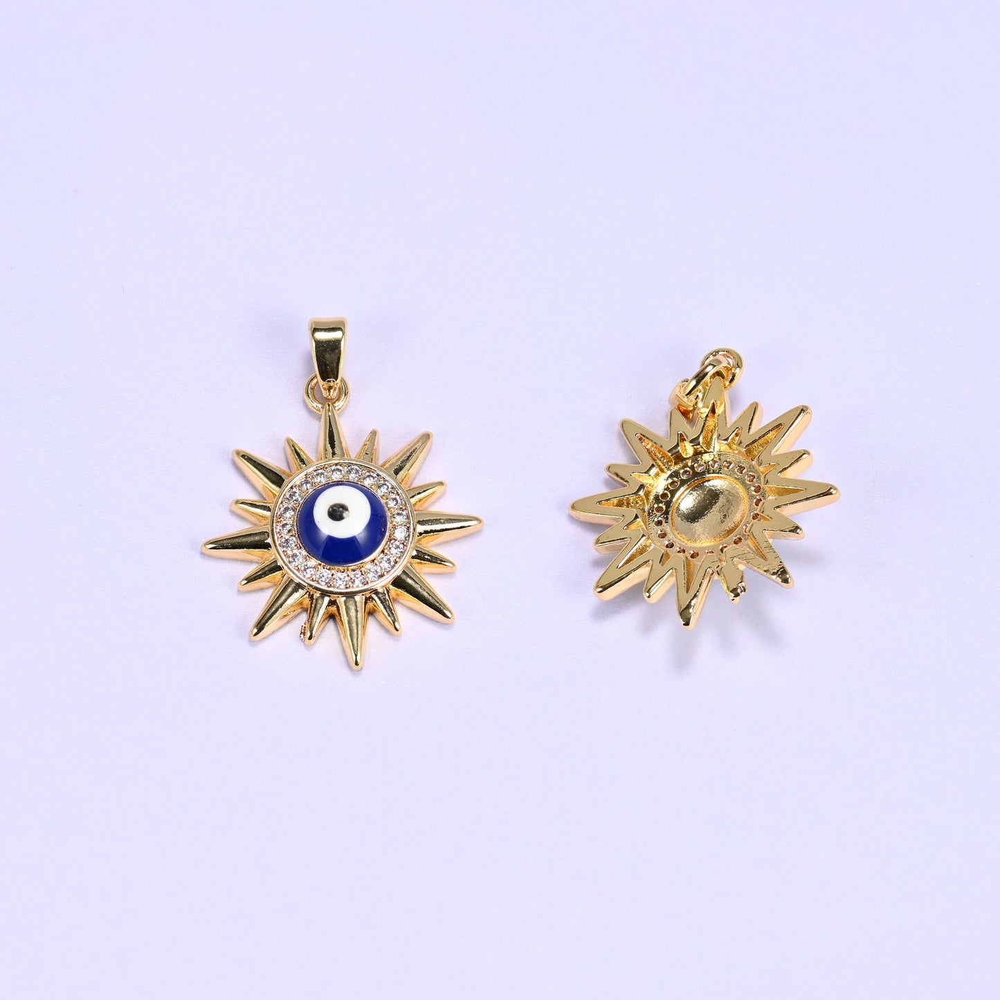 Evil Eye Sun Zircon Charms with a clear zircon halo