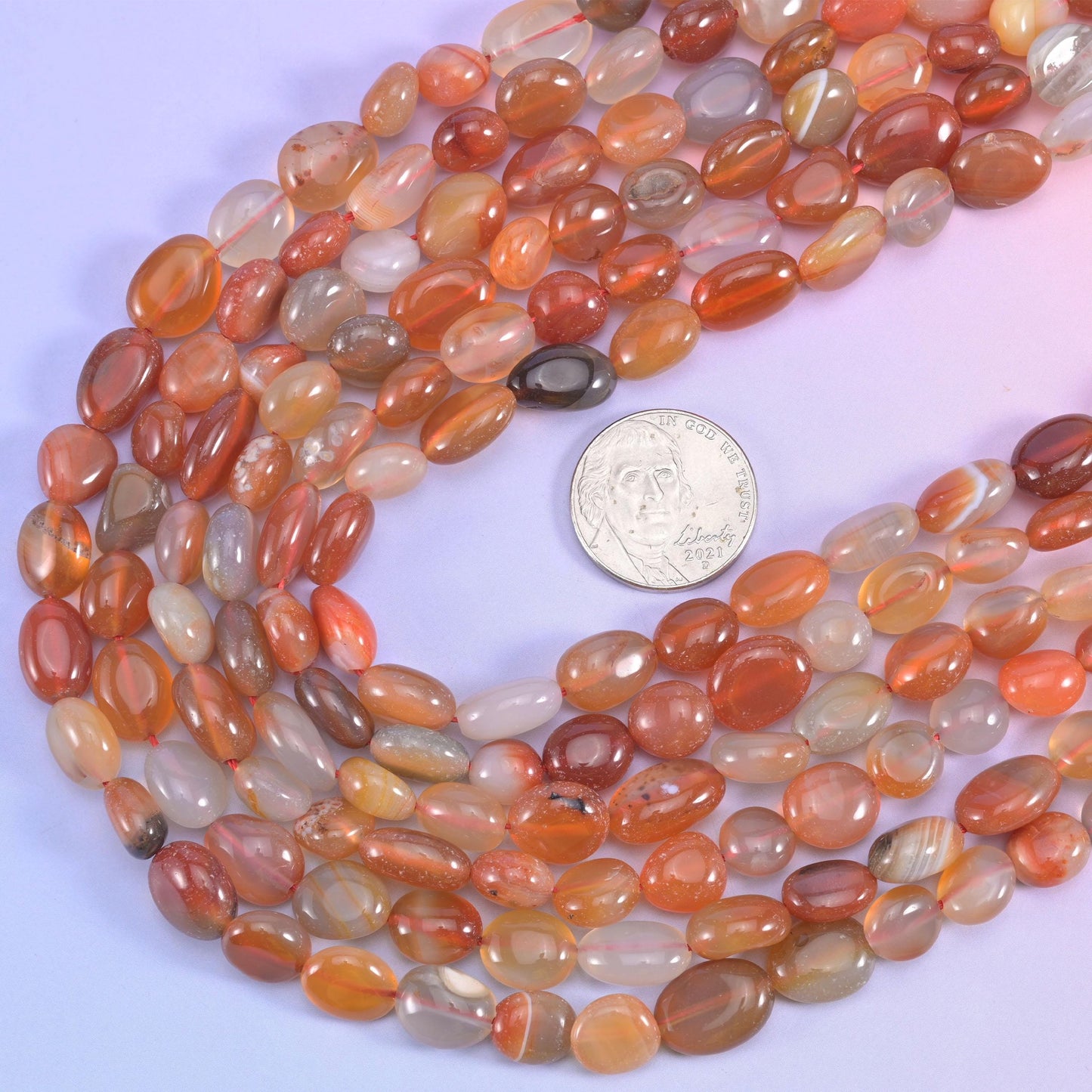 Pebble nugget cut red Botswana agate beads