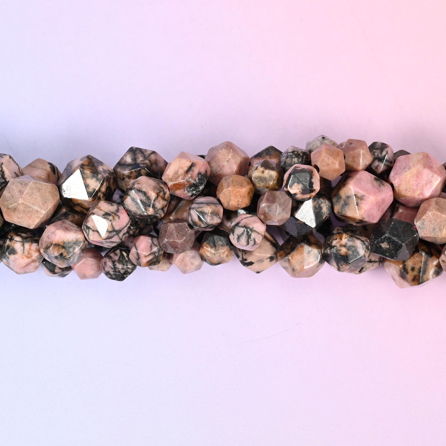 Black Line Rhodonite Faceted Diamond Star Cut Beads, soft rose pink broken up by heavy black dendritic veining