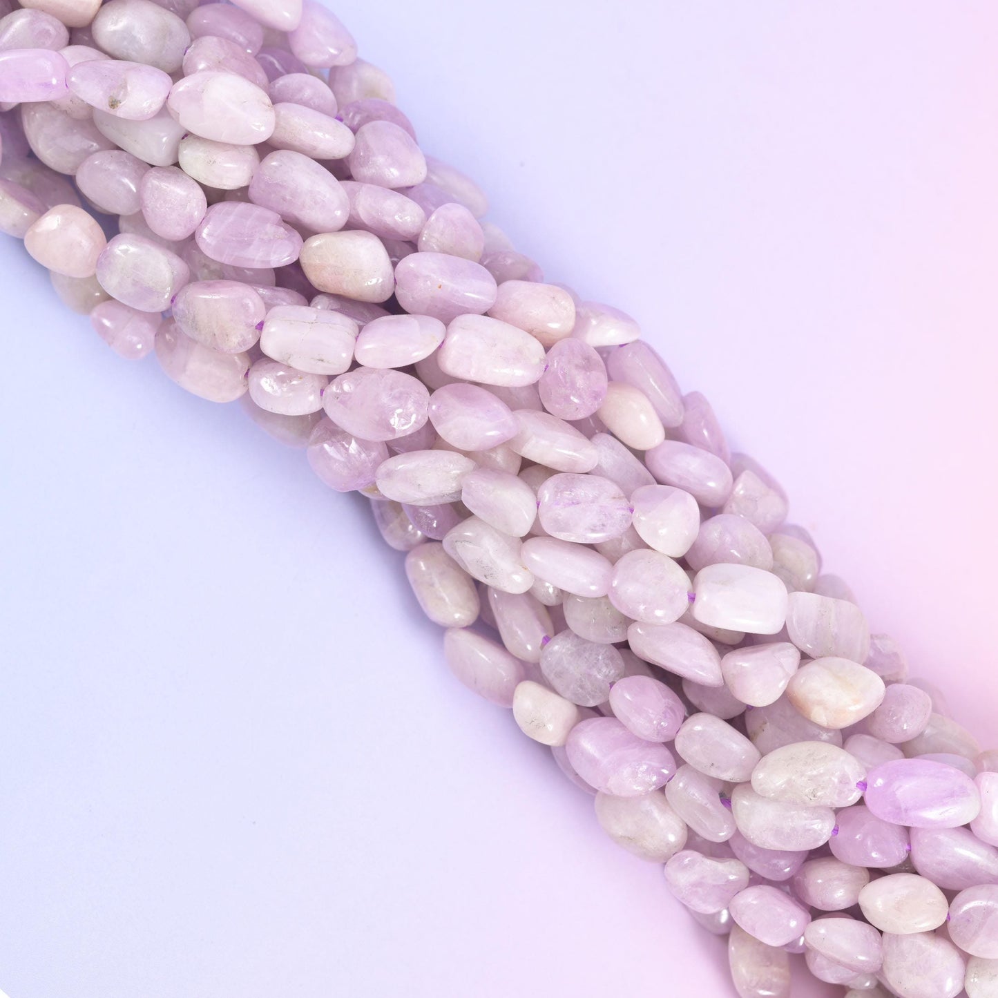 Kunzite pebble nugget beads, centre-drilled