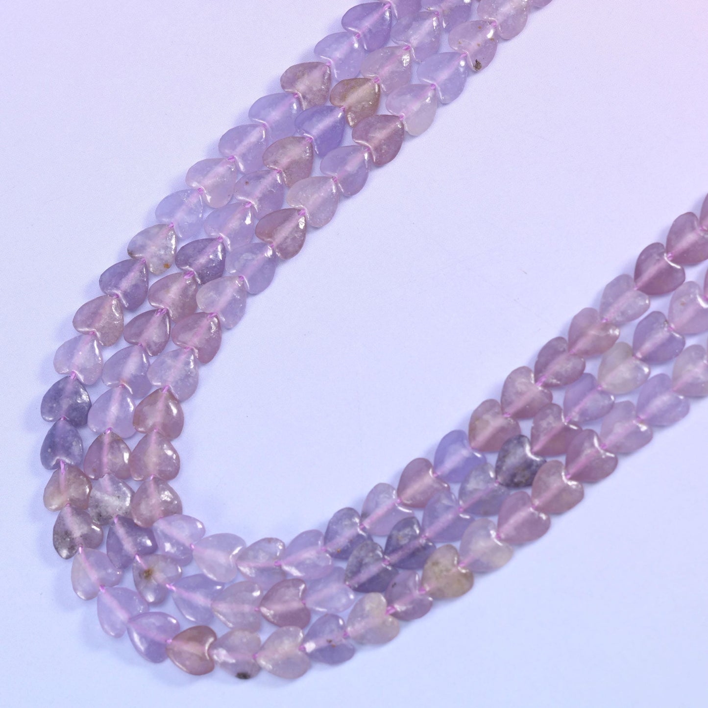 Heart cut lepidolite beads
