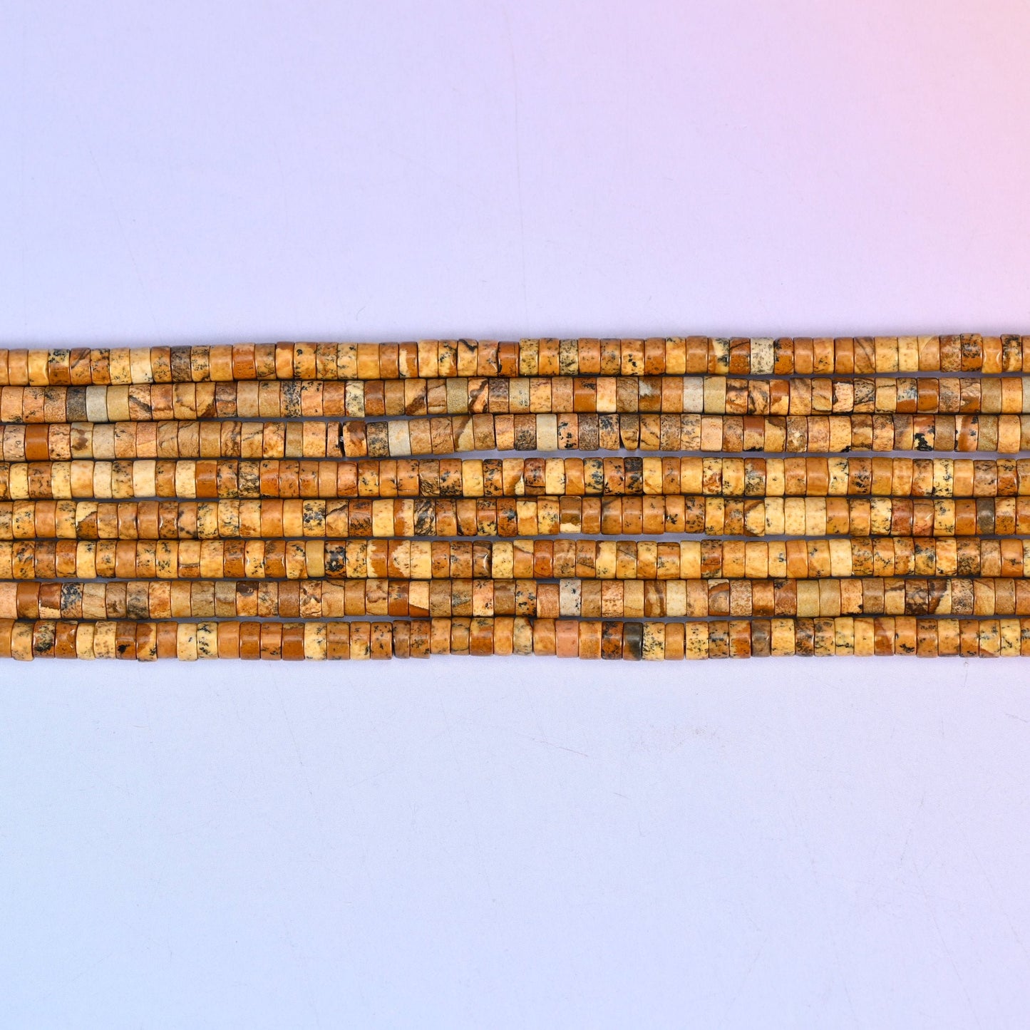 Picture Jasper Smooth Heishi Disc Beads in tan, brown and amber landscape patterning