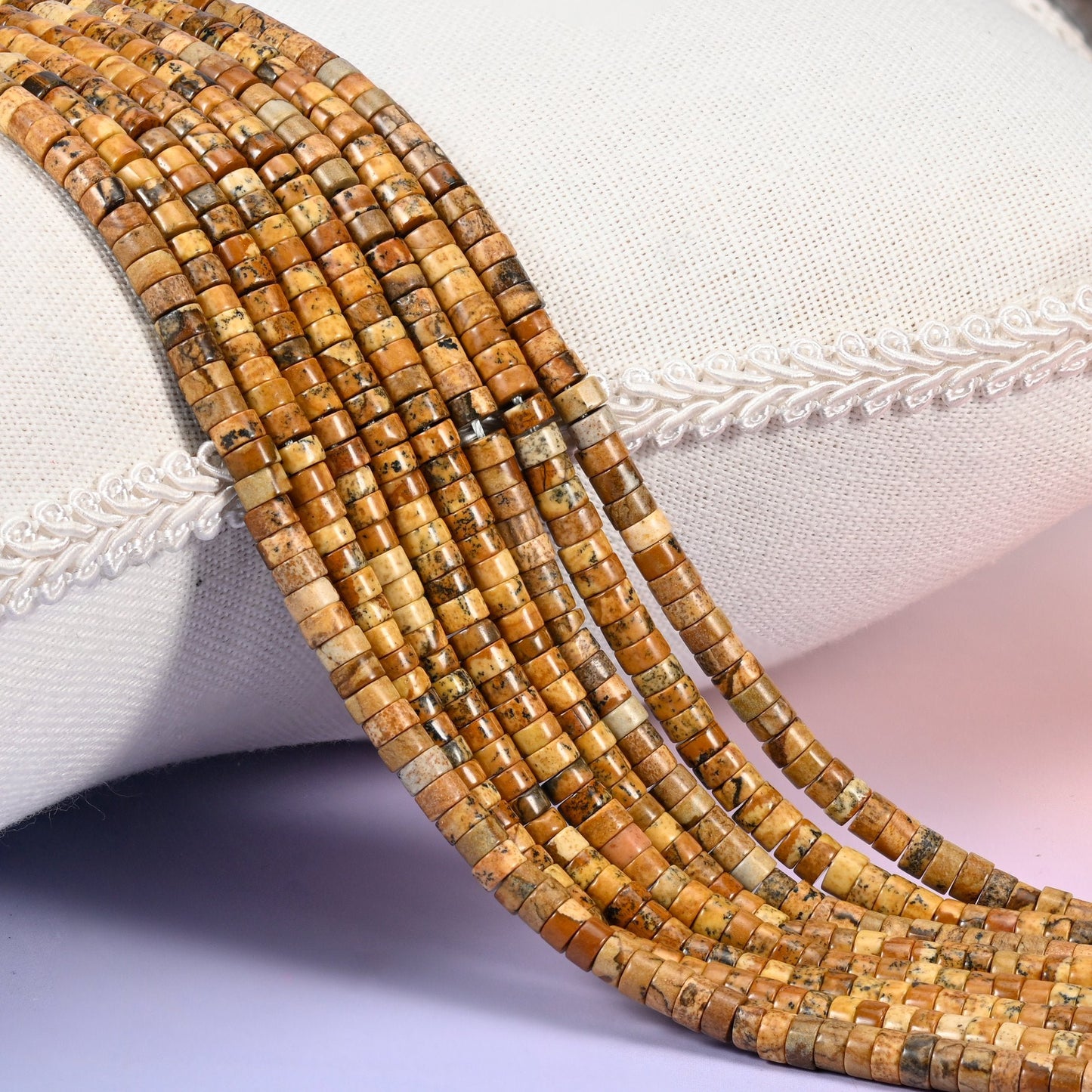 Natural Picture Jasper smooth heishi disc beads in warm desert tones of tan, brown and amber