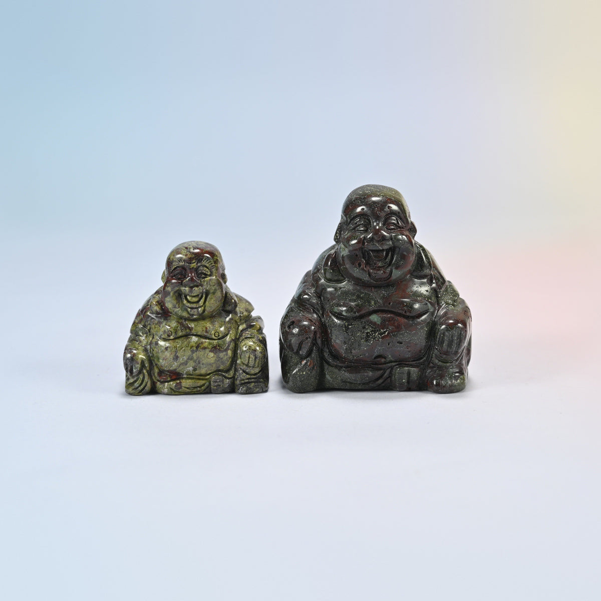 A 1.5 inch and a 2 inch dragon bloodstone laughing Buddha crystal carving, dark green natural stone with red patches