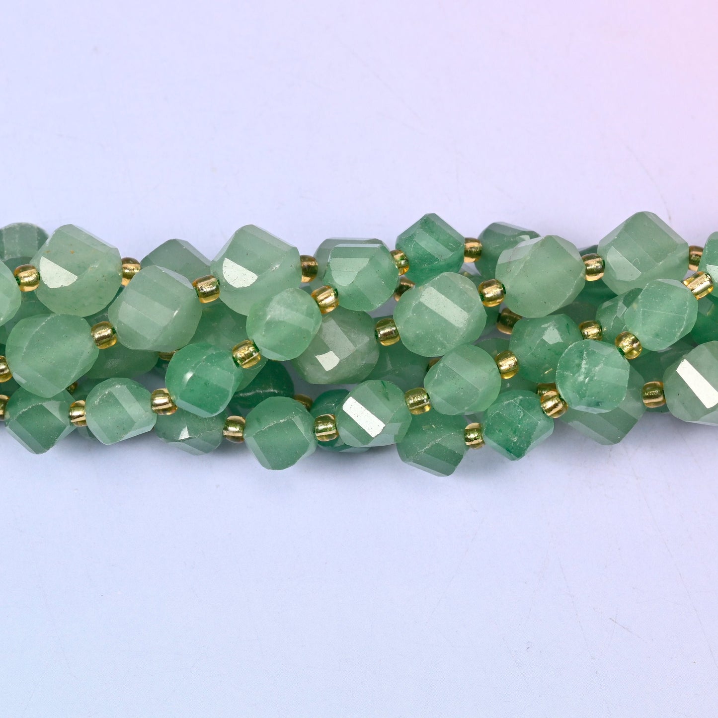 Lightly translucent green aventurine with paler cloudy zones