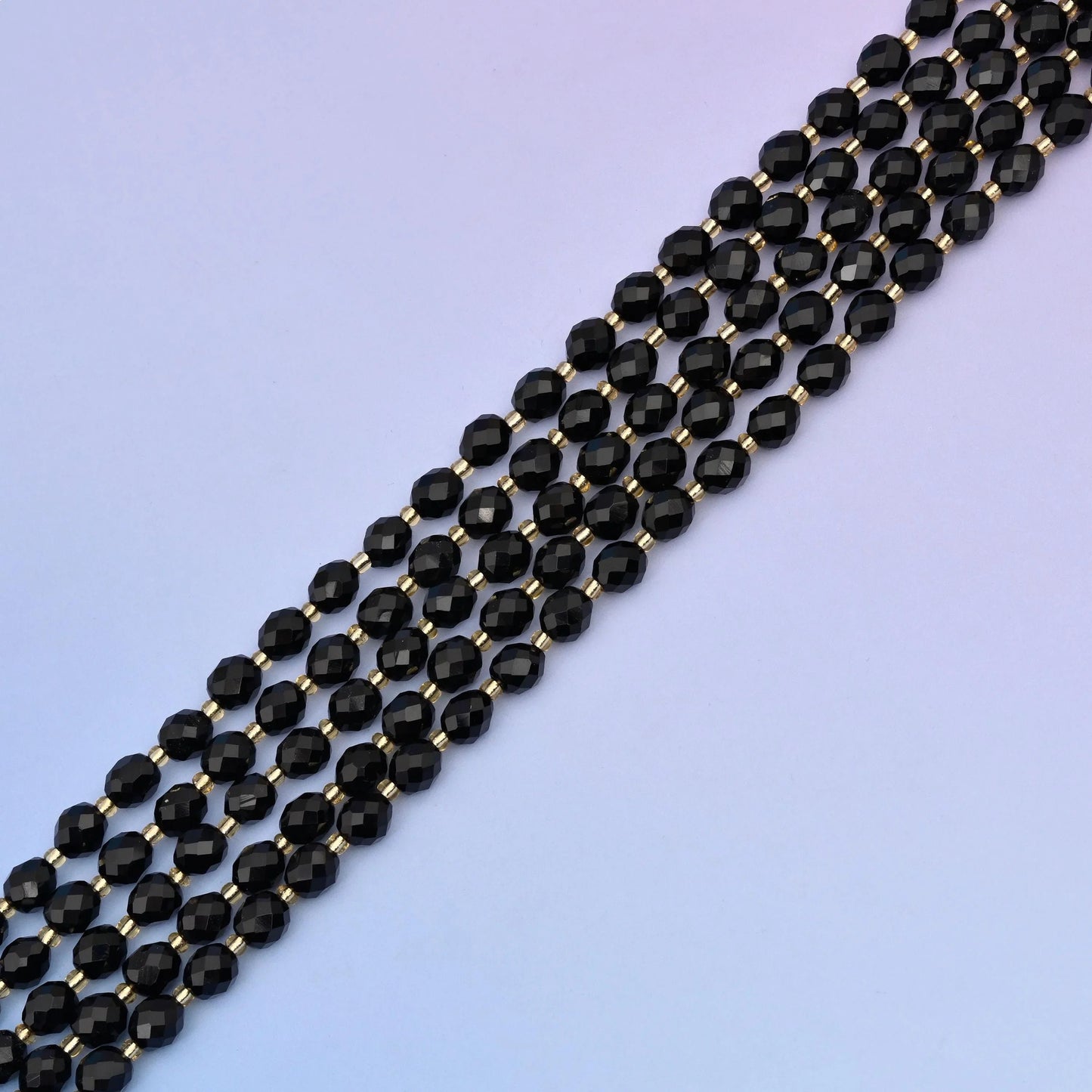 Black Obsidian rice barrel beads, approximately 39 beads per strand