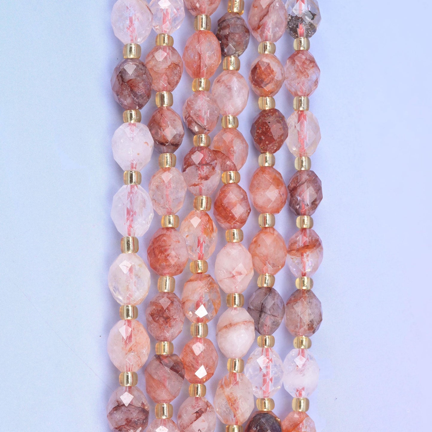 Red Hematoid Faceted Rice Barrel Beads, 15.5 inch strand