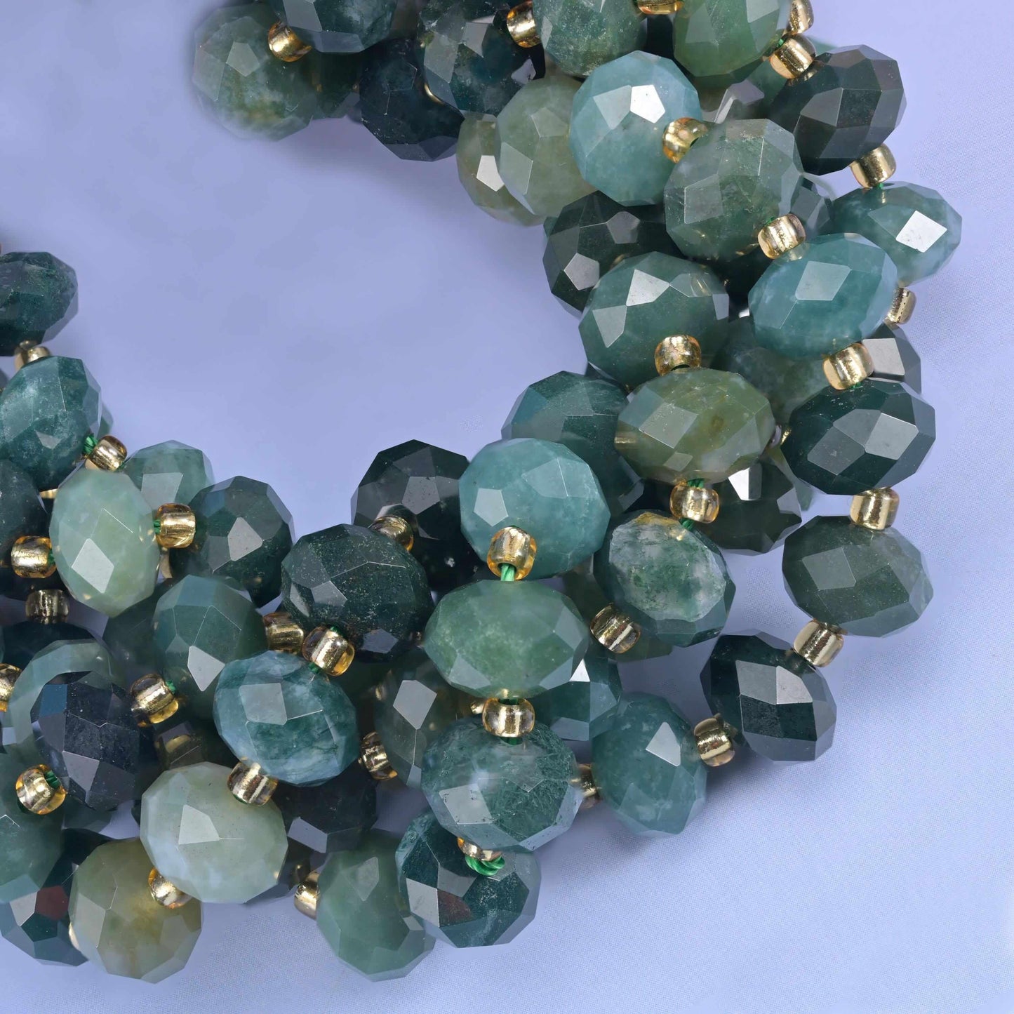 Faceted rondelle cut Moss Agate beads