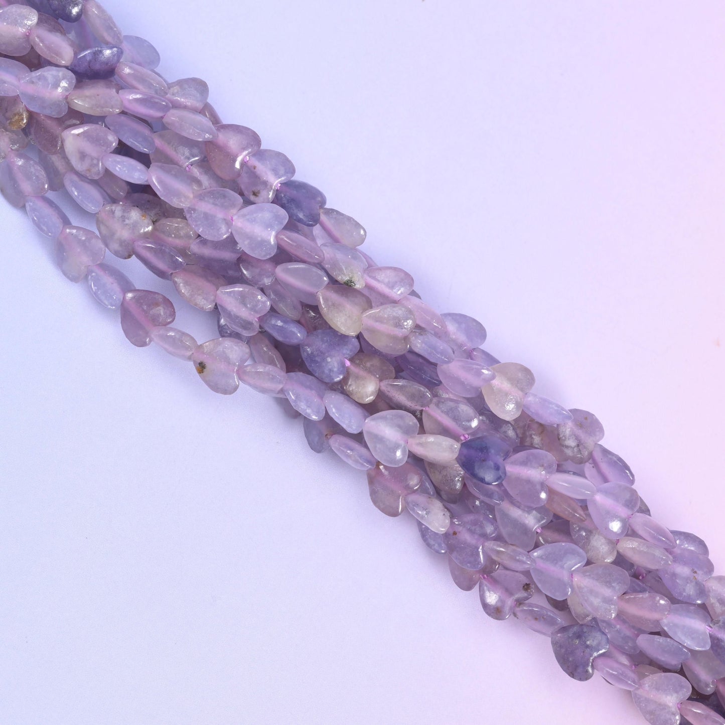 Lepidolite heart beads, approximately 70 beads per strand