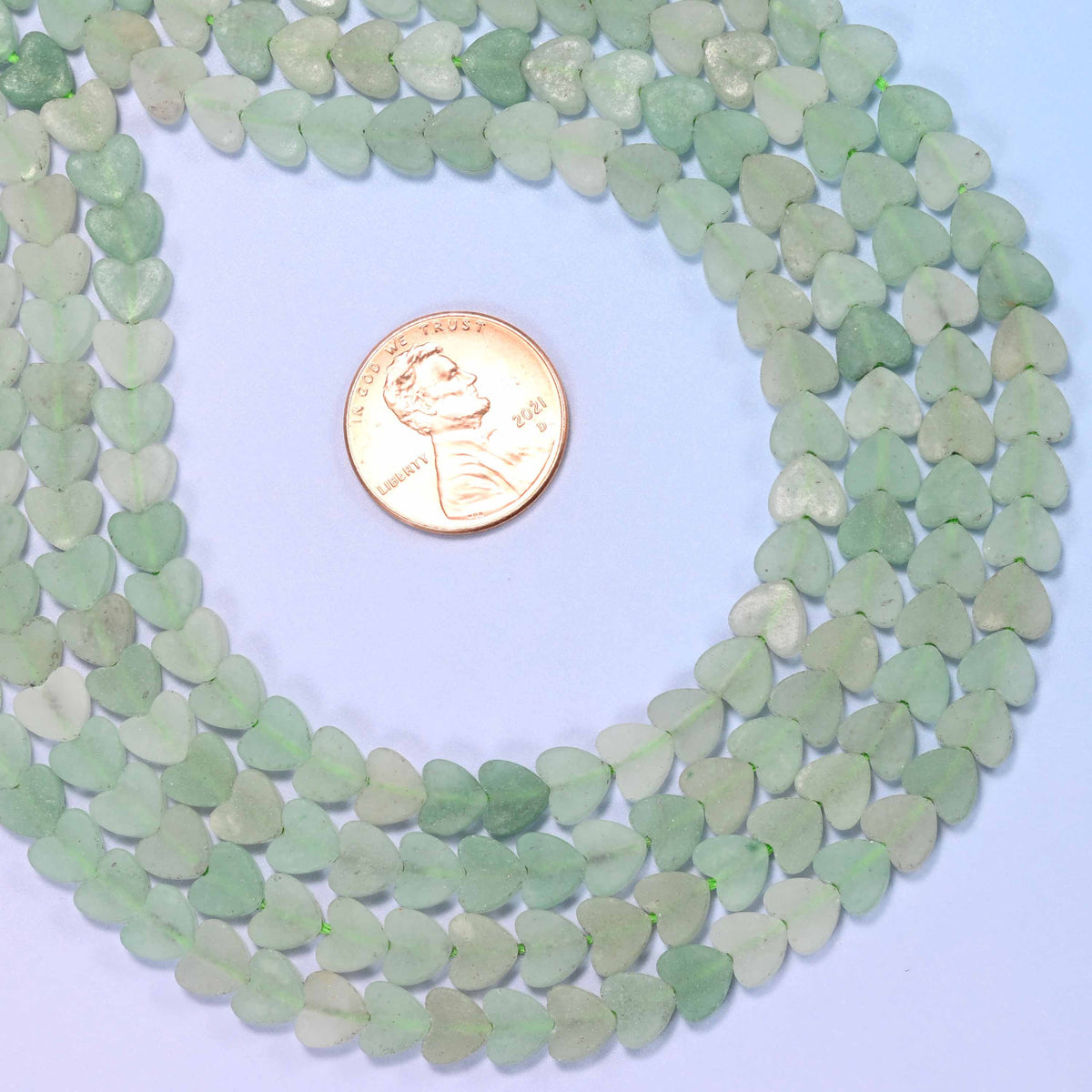 Matte green aventurine flat heart beads, approximately 68 per strand
