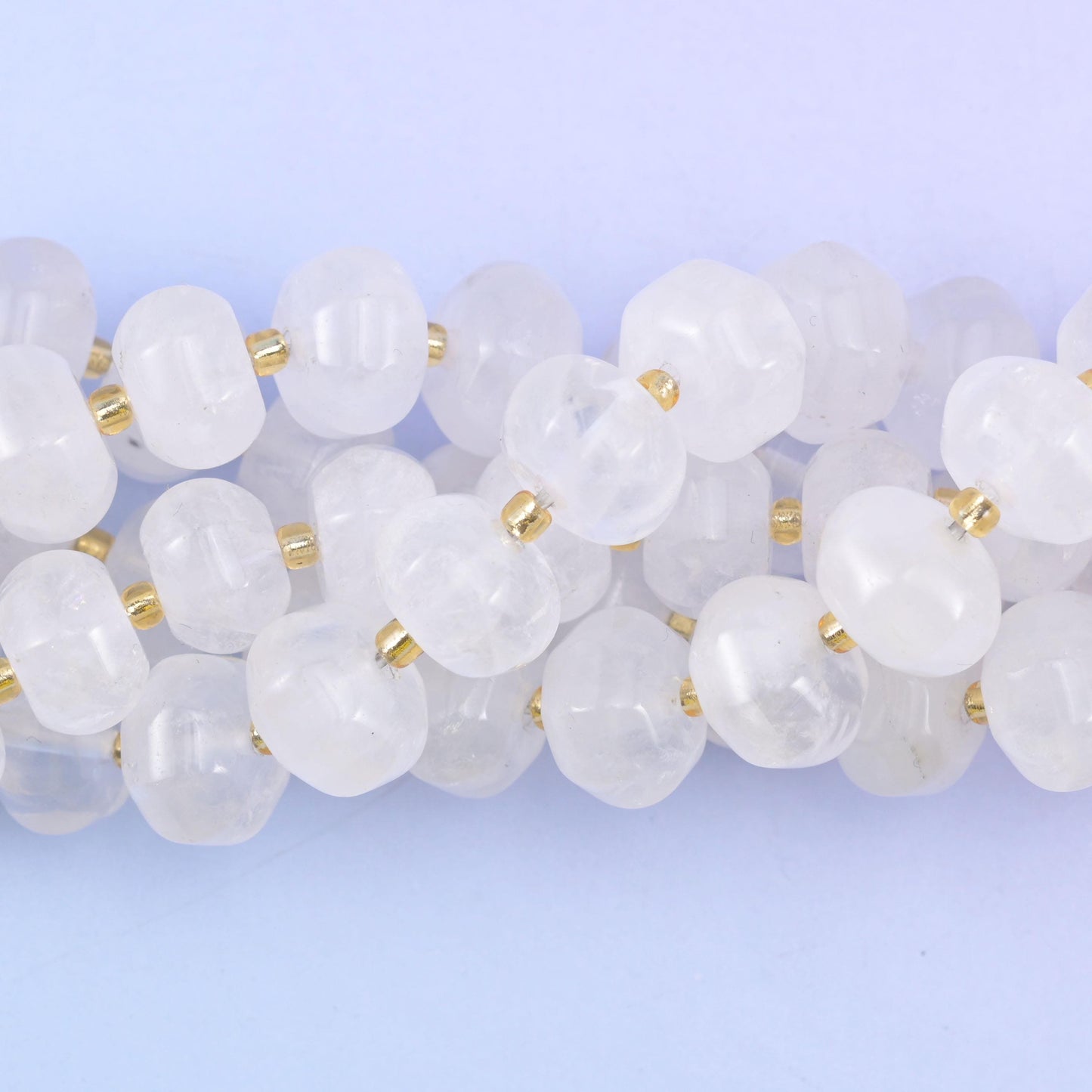 Macro of the bead sides, cloudy white quartz opening to clearer translucent patches