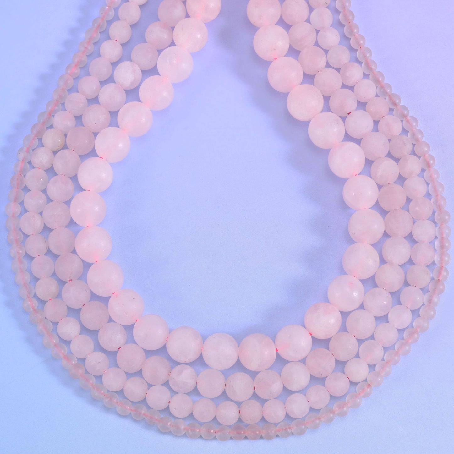 Rose quartz round beads, approximately 46 beads per 15 inch strand