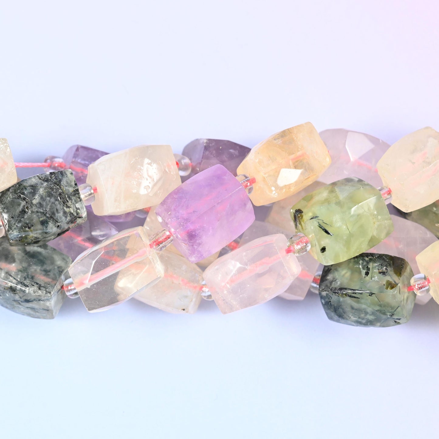 Big chunky rectangles alternating pale blush rose quartz, buttery citrine, lilac amethyst and mossy green prehnite