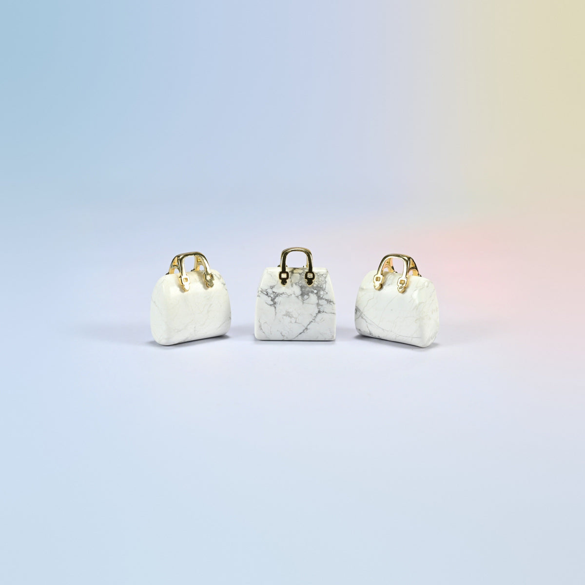 Three white howlite purse crystal carvings, 1 inch, white natural stone with gray veins, gold-tone handle