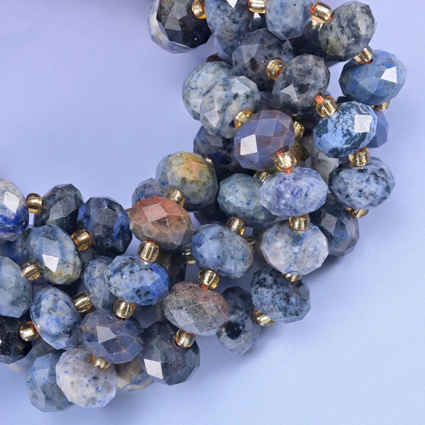 Faceted rondelle cut sunset dumortierite beads