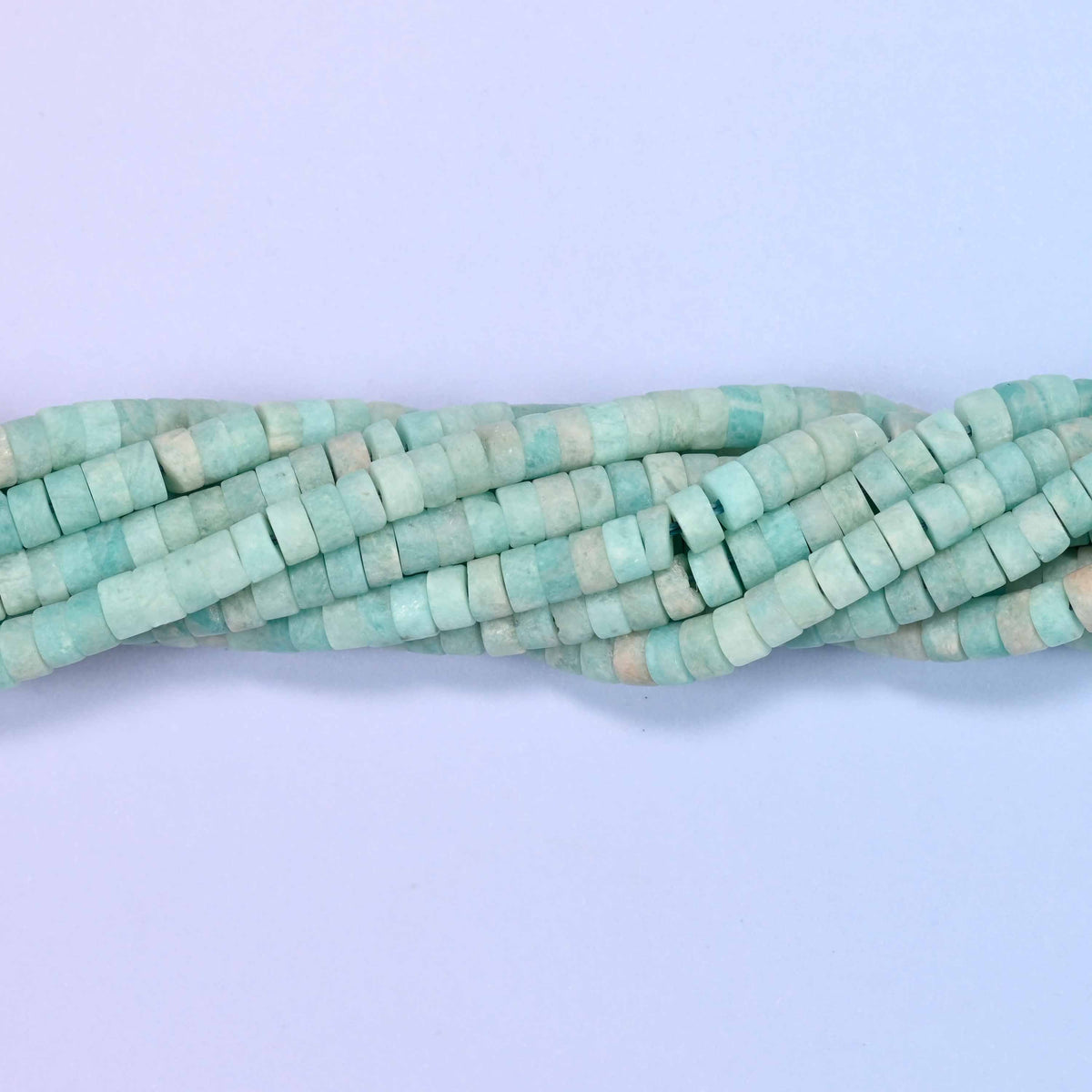 Natural blue amazonite matte heishi disc beads in soft blue-green tones with a sophisticated matte finish.
