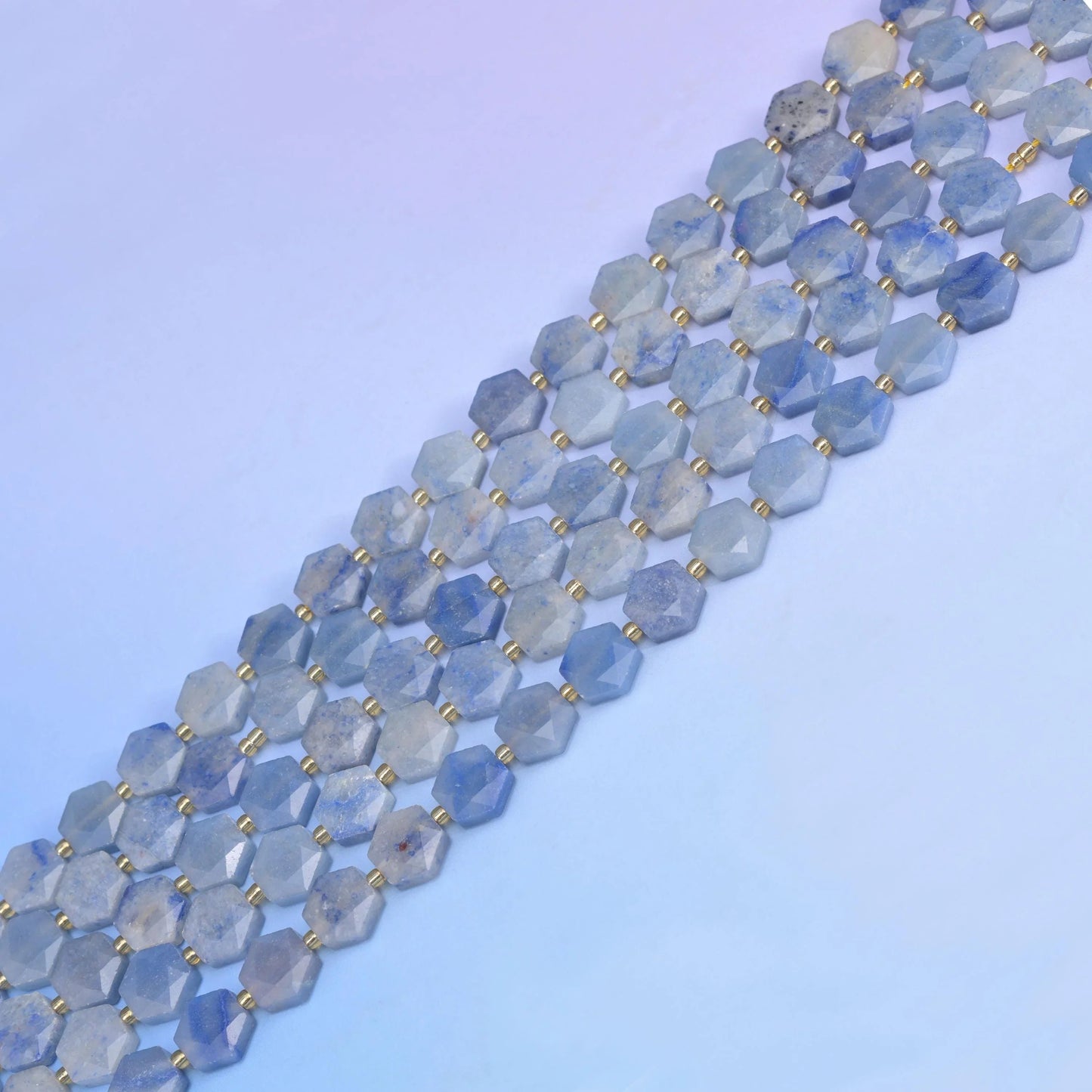 Blue Aventurine in powder blue with milky white patches.