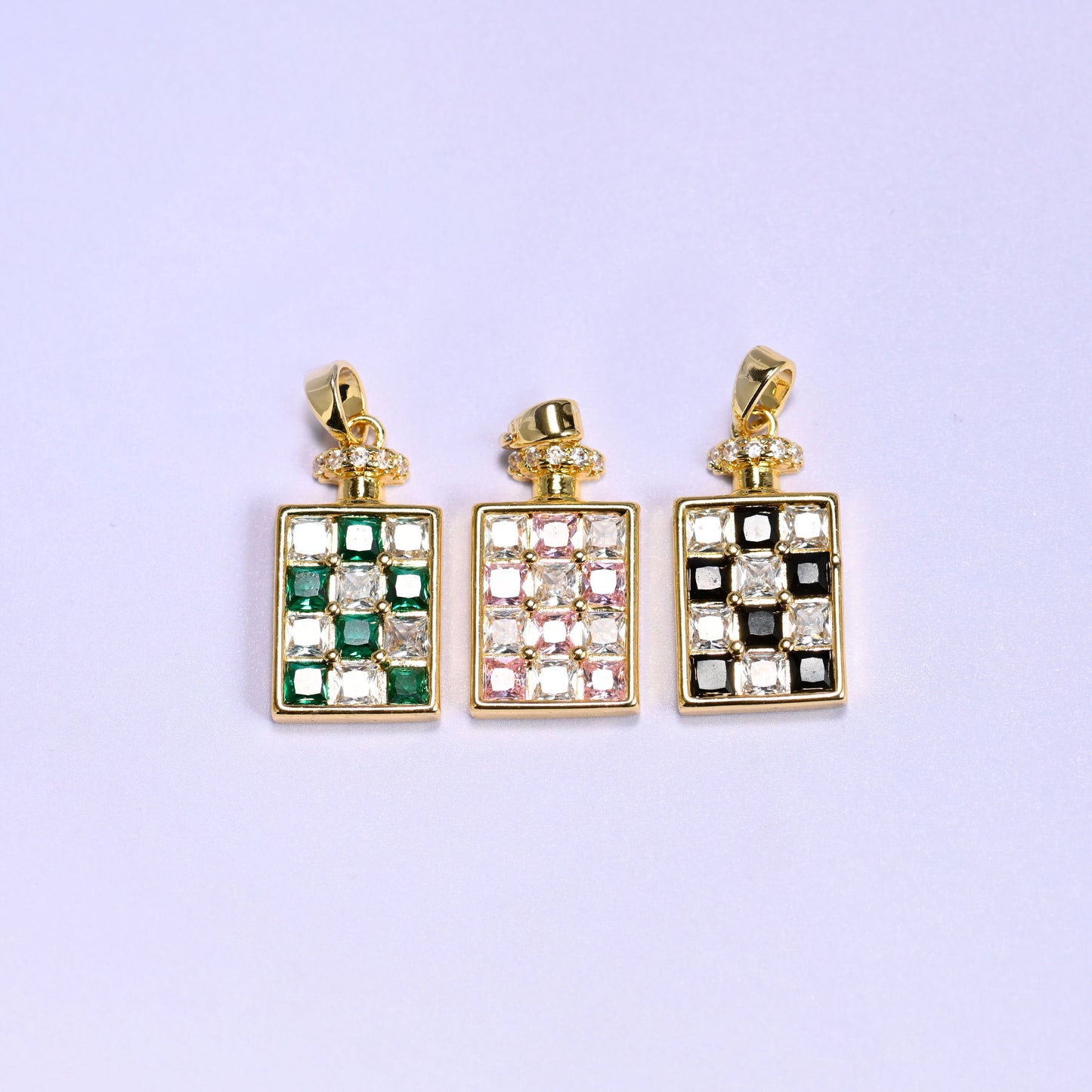 Perfume bottle charm in a rectangular bottle silhouette with pave zircon squares