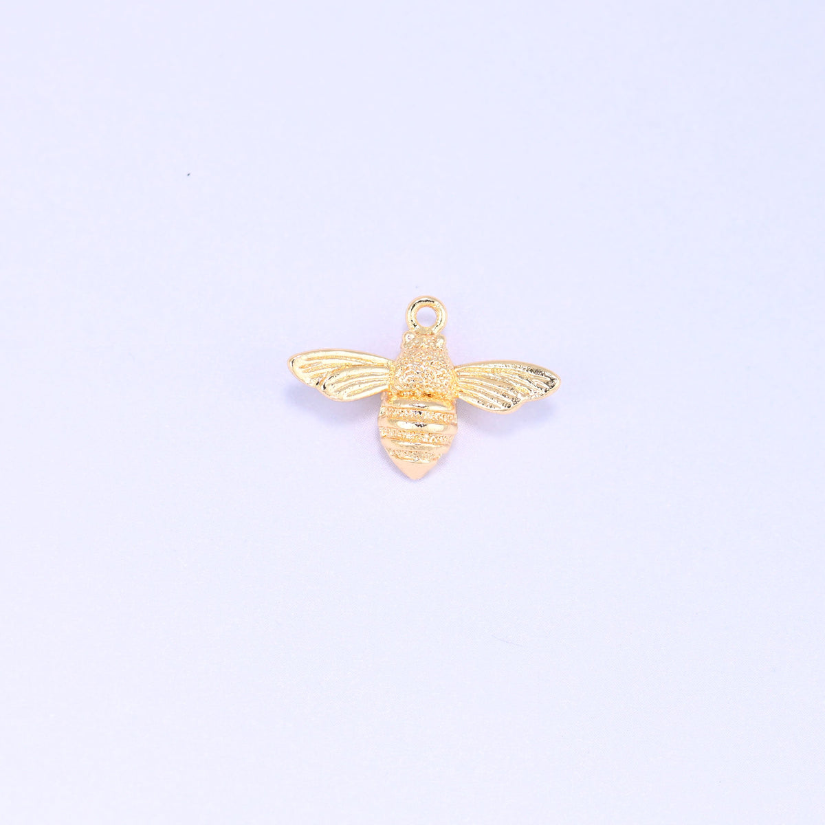 Small gold charms bee, single 18K gold plated brass charm shown front on with wings spread