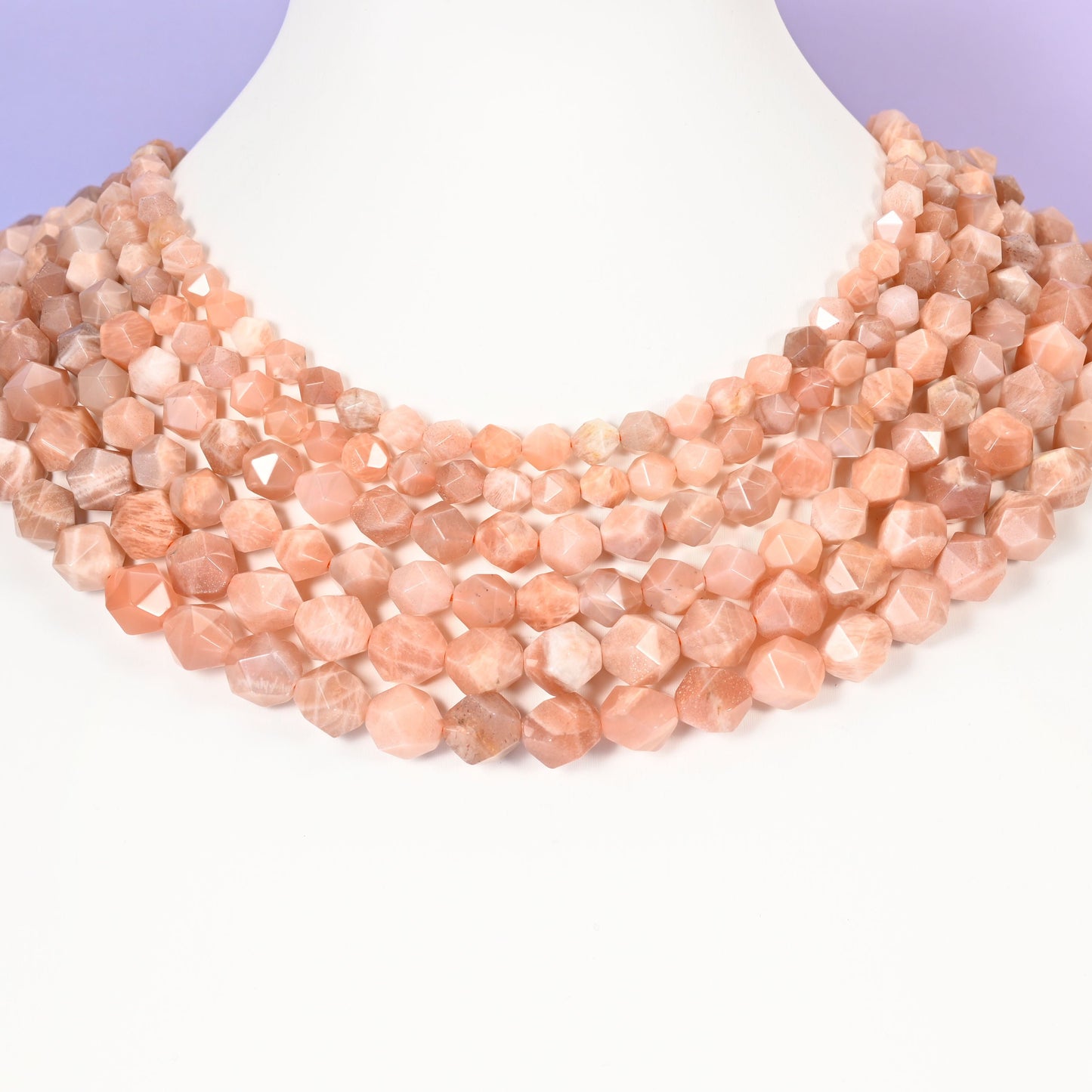 Sunstone diamond star cut beads in warm apricot and peach tones