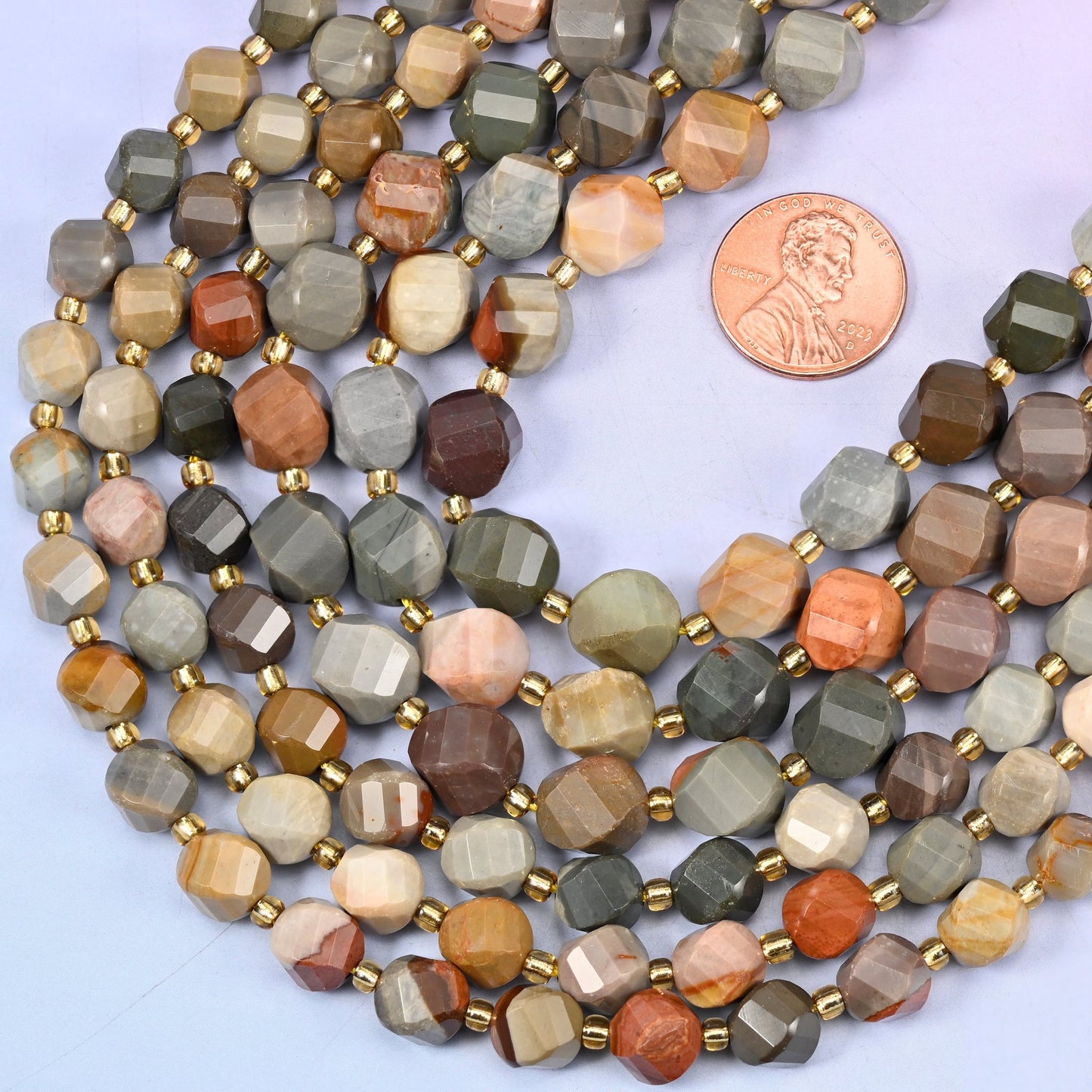 Faceted spiral twist cut american picture jasper beads