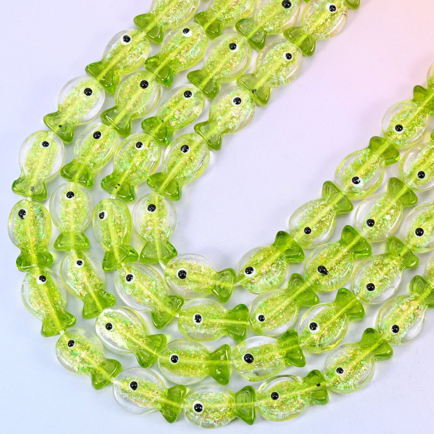 Iridescent Lime Green Fish Glass Beads, 15.5 inch strand