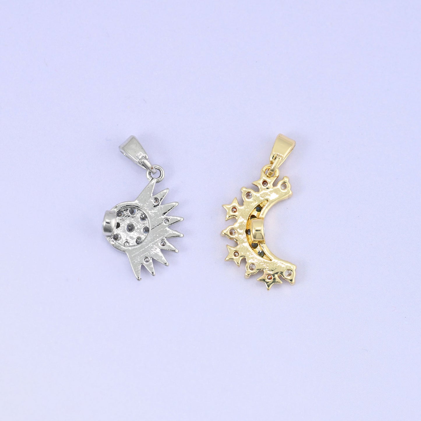 Sun and moon halves joined by a magnetic clasp connection