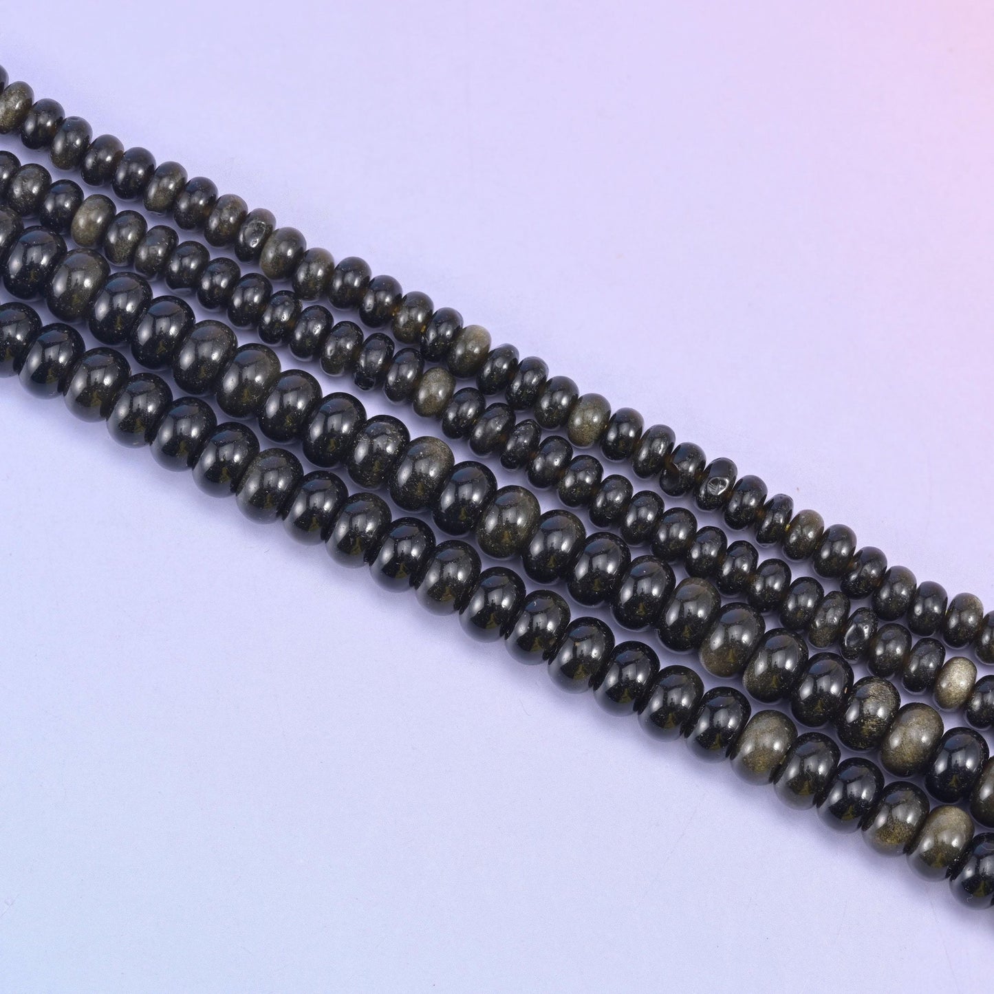 Gold Obsidian rondelle beads in glossy black with shimmering gold sheen