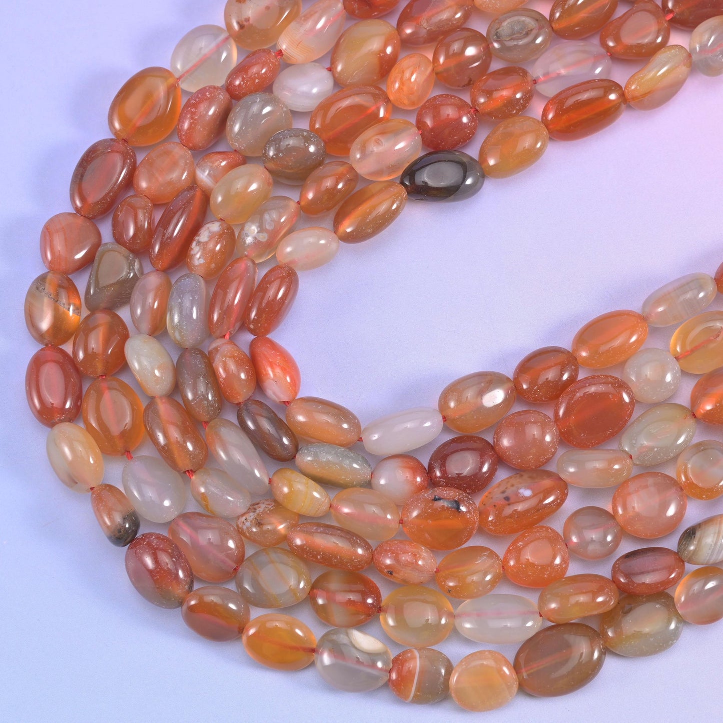 Red orange Botswana pebble nugget beads, 15.5 inch strand